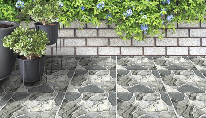 Họa tiết giả sỏi nổi bật với khả năng chống trượt hiệu quả và tạo điểm nhấn sinh động cho không gian sân vườn