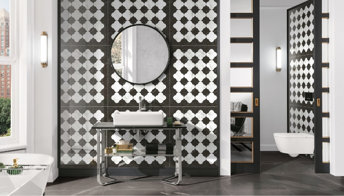 Phòng tắm nổi bật với gạch ốp tường họa tiết lập thể đen trắng, tạo điểm nhấn sang trọng và đầy cá tính cho không gian thư giãn hiện đại